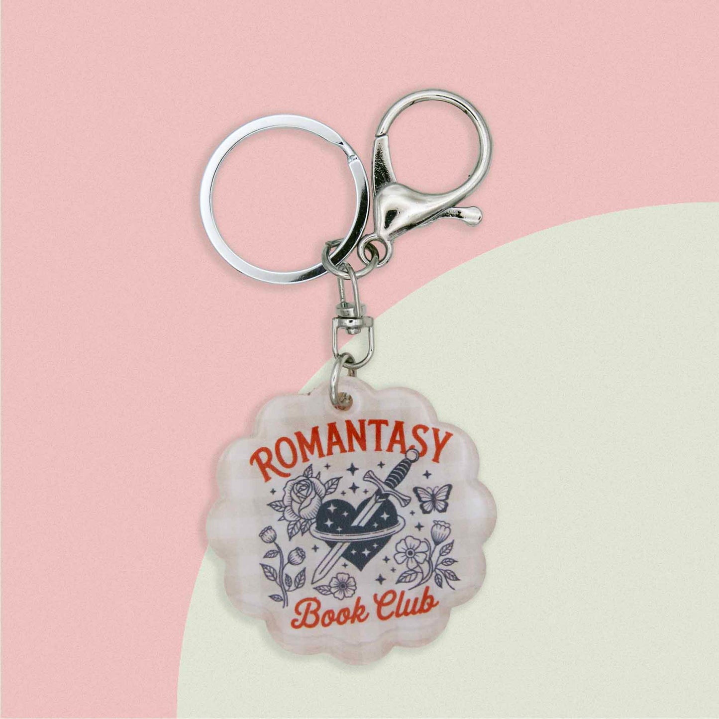 Romantasy Book Club keychain, featuring a heart, dagger, roses, butterfly, and stars design, perfect for readers.