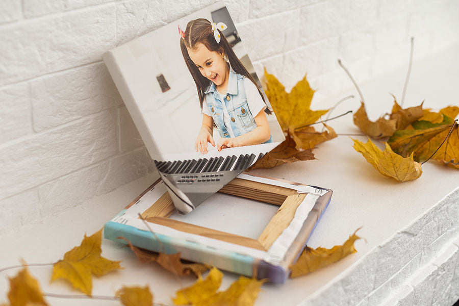 Dry autumn leaves and photo canvas