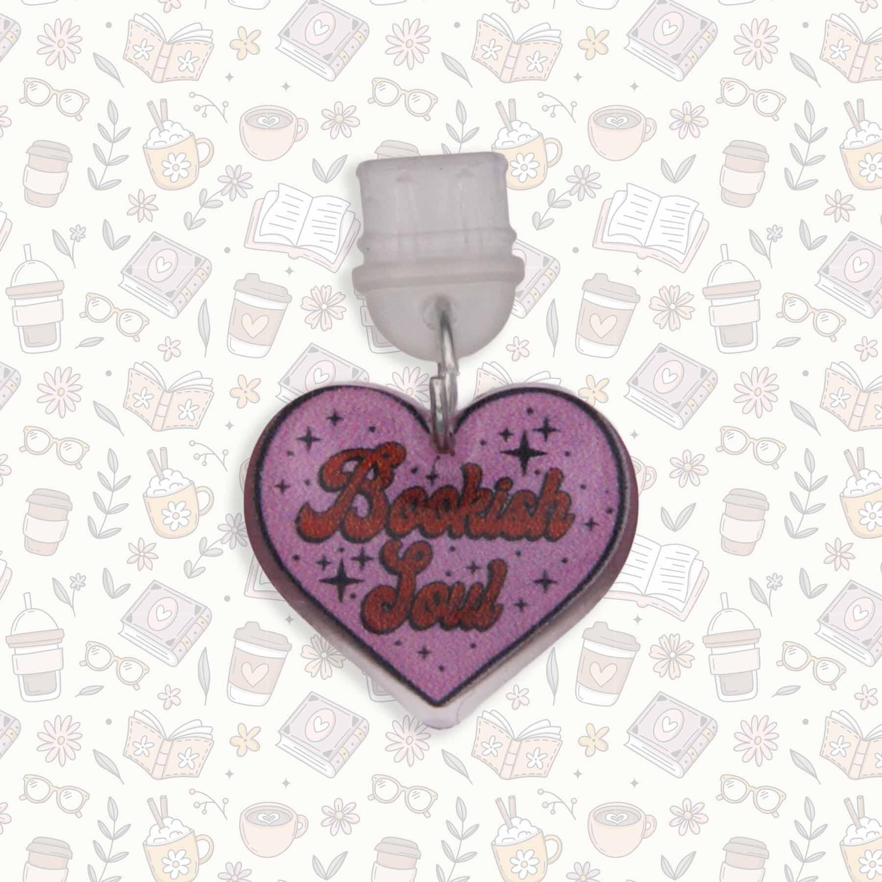 Heart-shaped "Bookish Soul" Kindle charm with purple background and red text, UV resin sealed, for USB C devices.