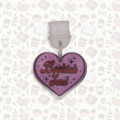 Heart-shaped "Bookish Soul" Kindle charm with purple background and red text, UV resin sealed, for USB C devices.