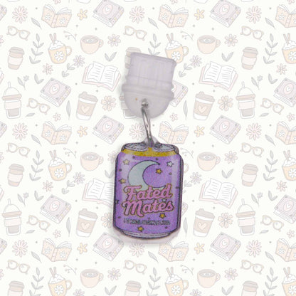 Fated Mate soda can Kindle charm and USB-C dust plug, purple with moon and stars, on bookish background