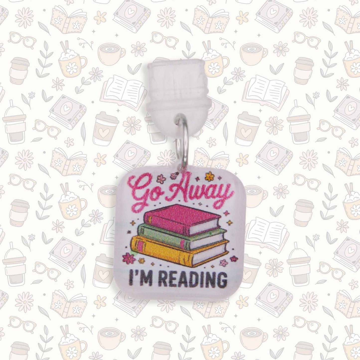 Go Away I'm Reading Kindle charm with stack of colorful books, USB-C dust plug. Clear acrylic, glossy resin.