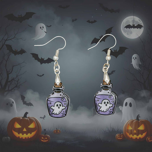 Halloween ghost in a potion bottle dangle earrings with silver hooks, set against a spooky night sky with bats, ghosts, and glowing jack-o'-lanterns.