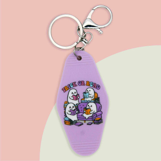 Purple plastic keychain with \
