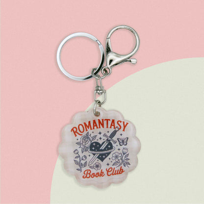 Romantasy Book Club keychain, featuring a heart, dagger, roses, butterfly, and stars design, perfect for readers.